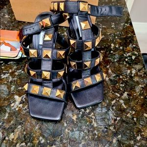 Black and gold Steve Madden shoes